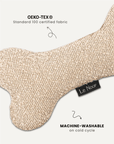 Beige boucle bone dog toy close-up, Le Noof