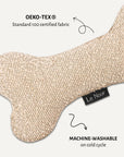 Beige boucle bone dog toy close-up, Le Noof