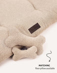 Beige boucle bone dog toy with matching dog bed, Le Noof