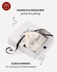 Le Noof product packaging , drawstring bag inside a white box packaging on a white background