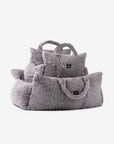 2 Grey dog car beds in 2 sizes stacked on each other