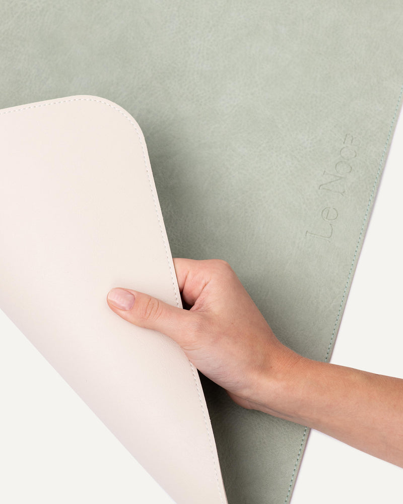 Reversible beige and green dog bowl mat by Le Noof