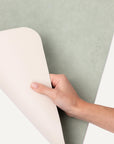 Reversible beige and green dog bowl mat by Le Noof