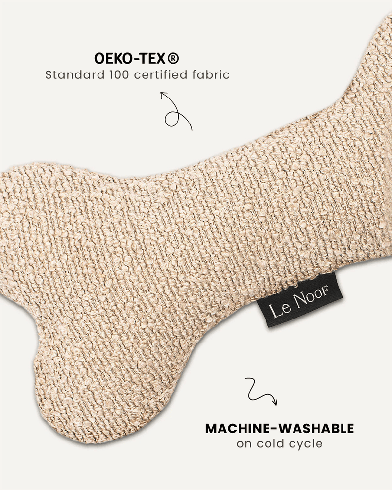 Beige boucle bone dog toy close-up, Le Noof