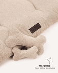 Beige boucle bone dog toy with matching dog bed, Le Noof