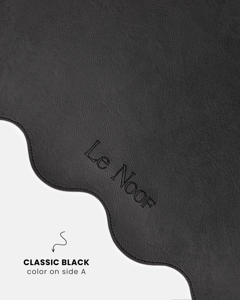 Black side of wavy double-sided dog bowl mat, Le Noof