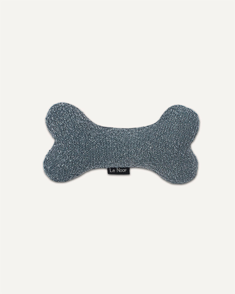Blue bone boucle dog toy made by Le Noof