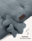 Blue boucle bone dog toy with matching floor pillow, Le Noof