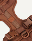 Brown dog harness with Le Noof logo super closeup