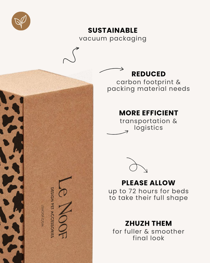 Le Noof dog bed in cardboard packaging