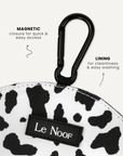 Cow print dog treat pouch close-up, Le Noof