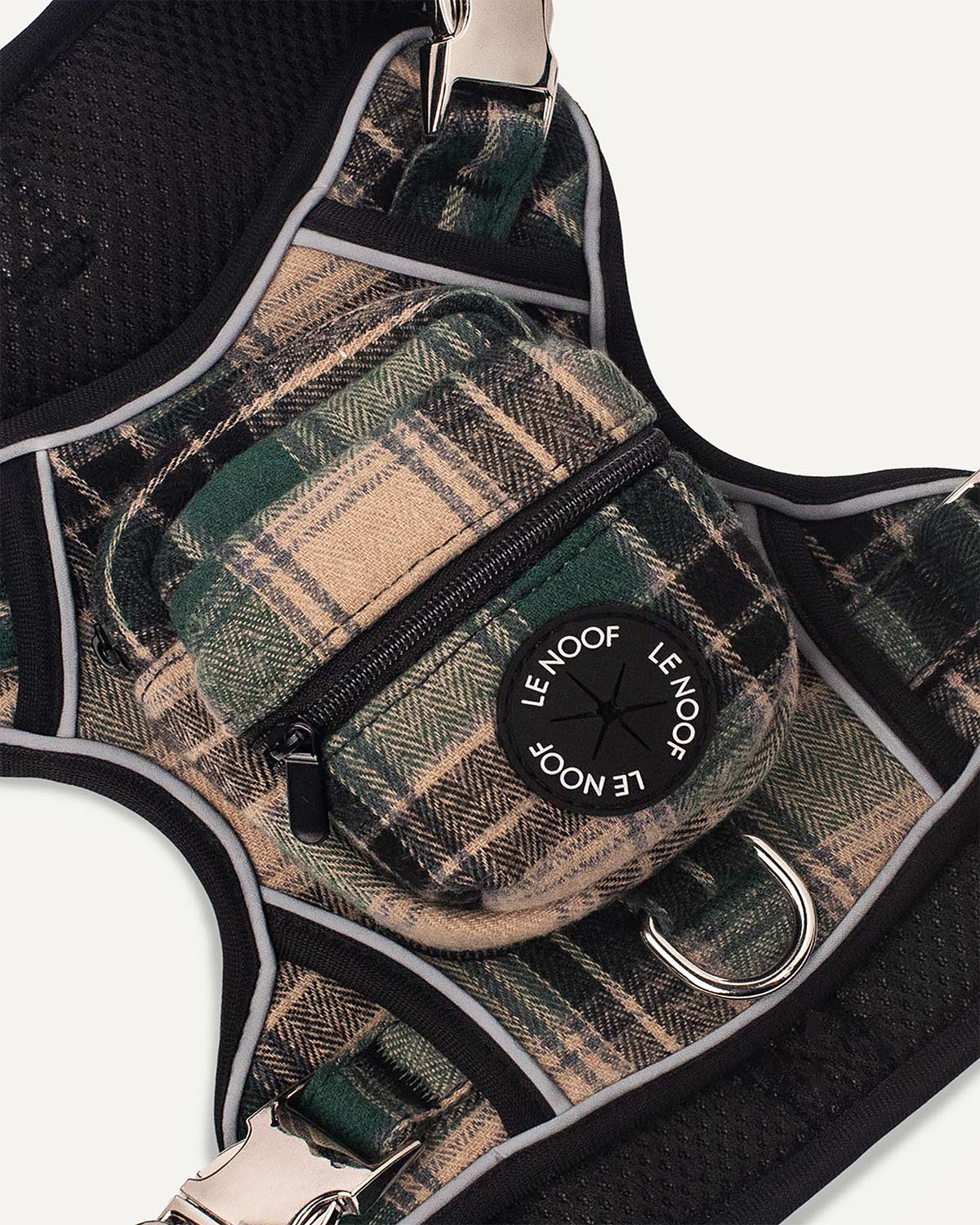 Green flannel dog harness with Le Noof logo super closeup
