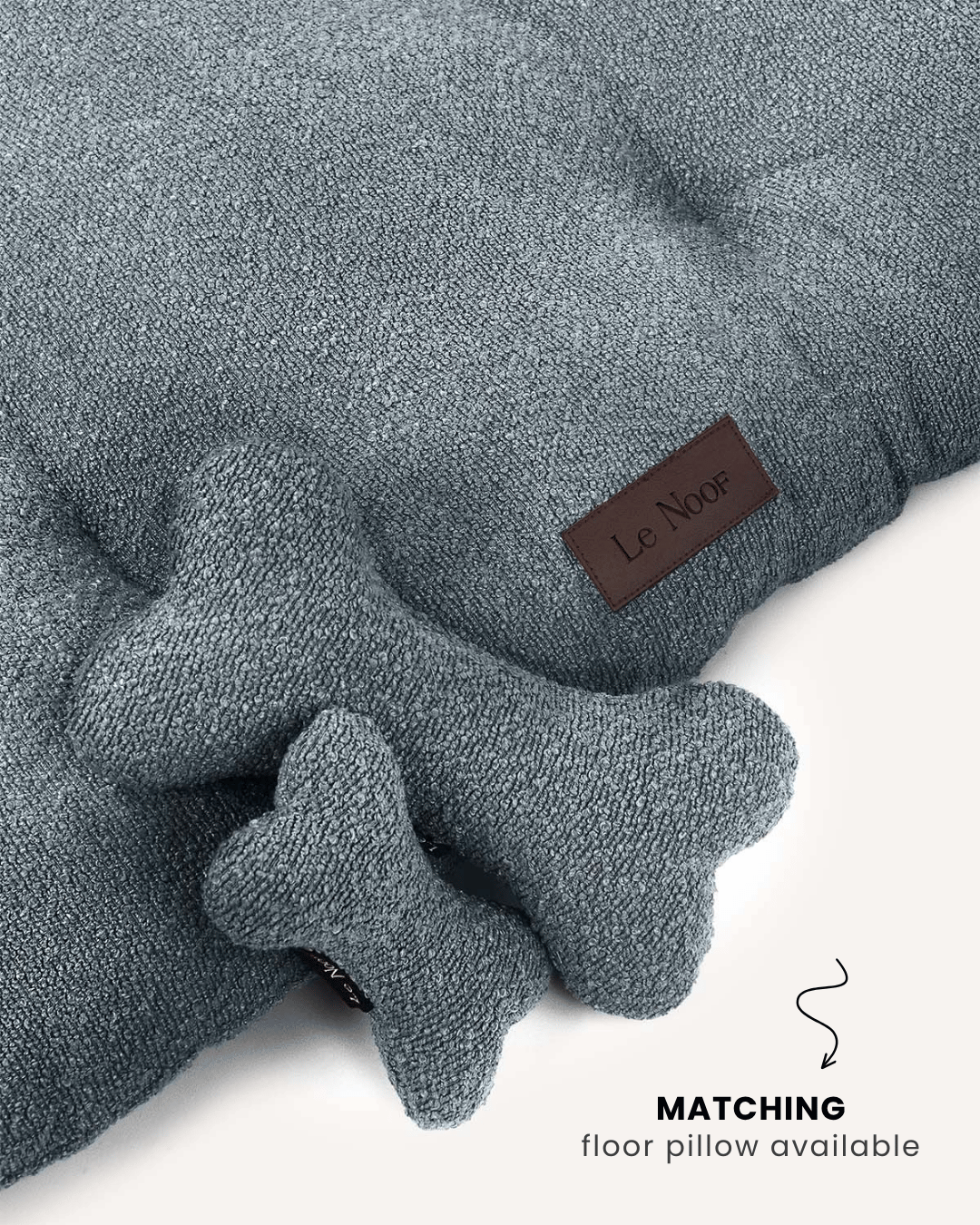 Blue boucle bone dog toy with matching floor pillow, Le Noof