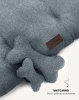 Blue boucle bone dog toy with matching floor pillow, Le Noof