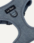 Light blue denim dog harness with Le Noof logo super closeup