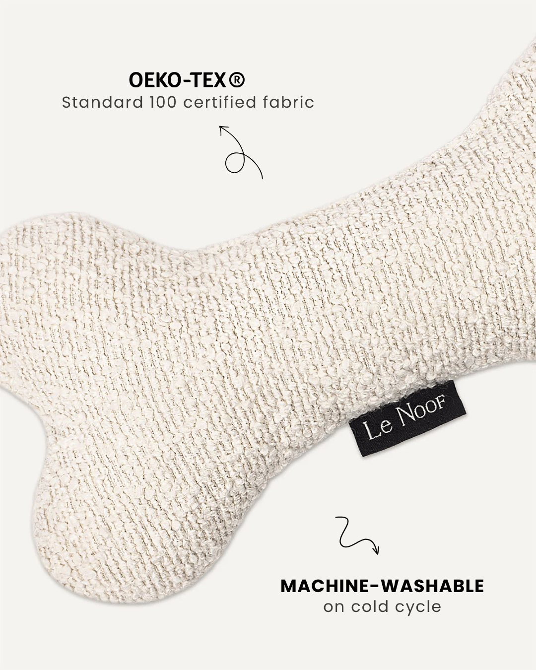 Cream white boucle bone dog toy close-up, Le Noof