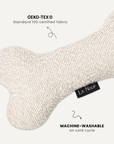 Cream white boucle bone dog toy close-up, Le Noof