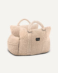 Beige Teddy car travel dog bed from Le Noof