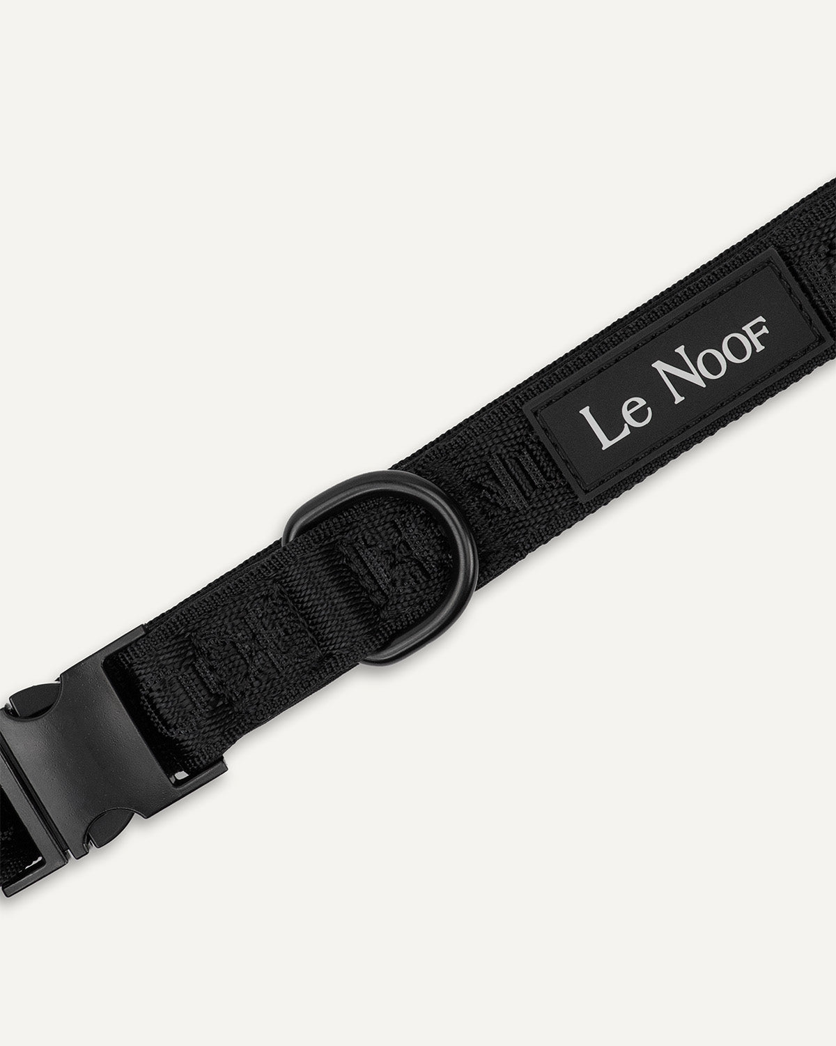 black jacquard dog collar close up image with Le Noof logo
