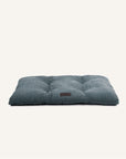 Dark blue Boucle Dog Pillow bed on white background