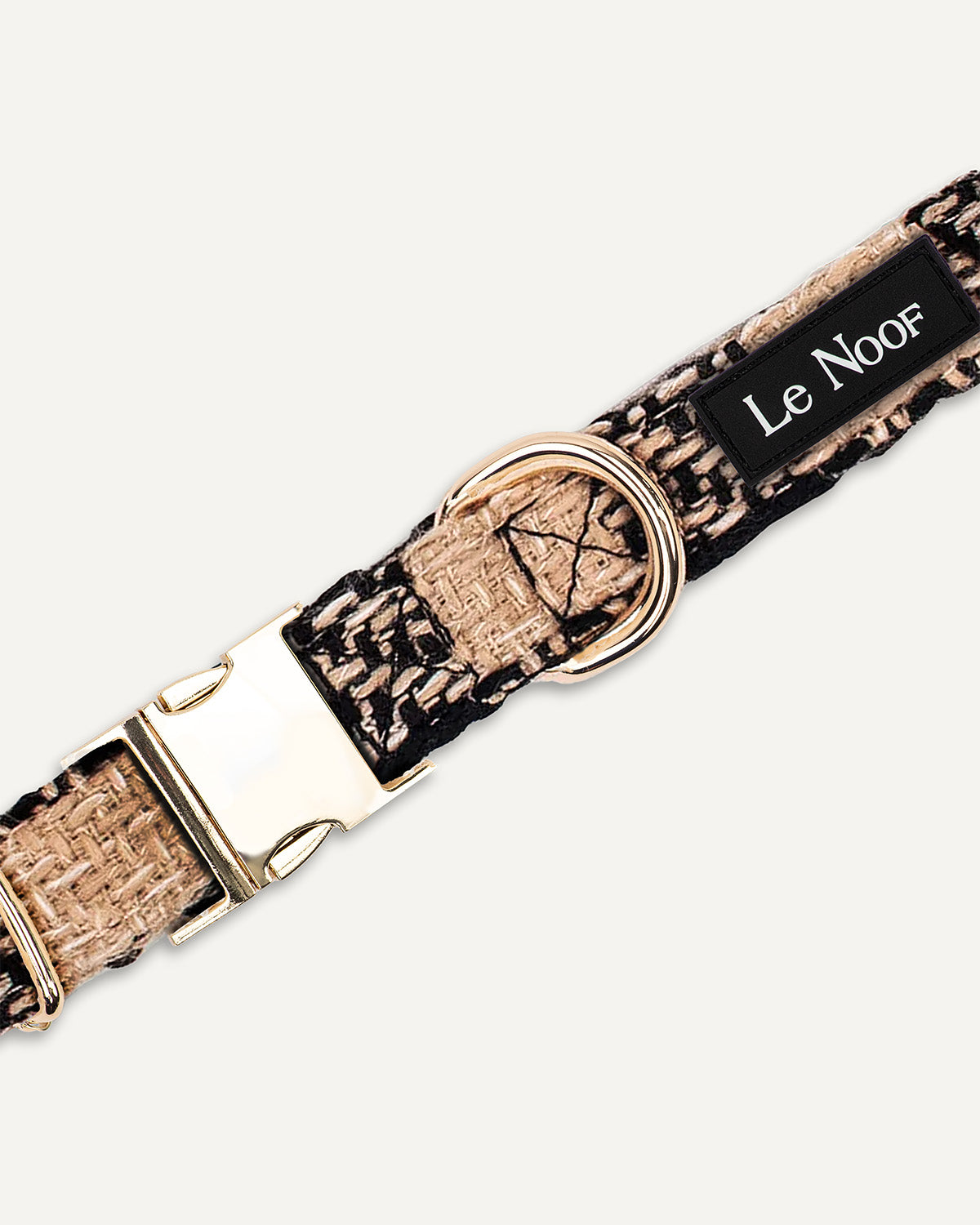 Brown checkered dog collar close up image with Le Noof logo