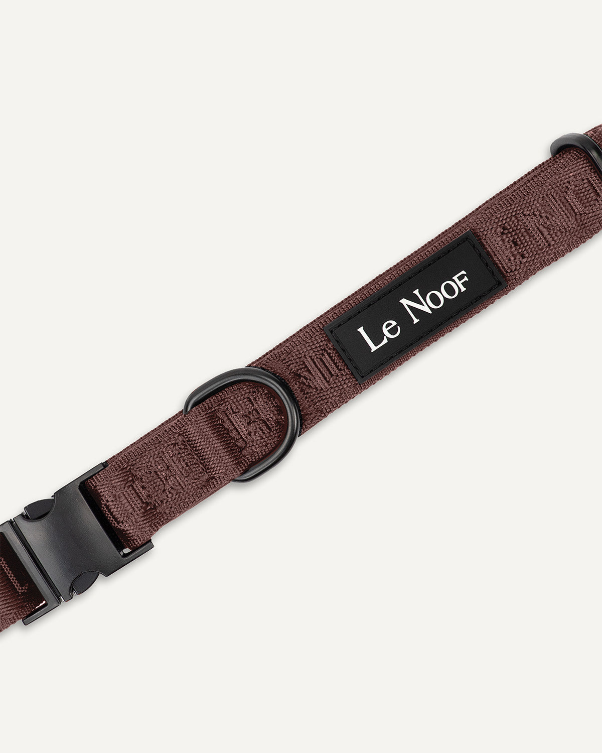 Brown jacquard dog collar close up image with Le Noof logo