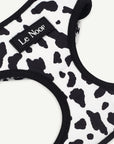 Cow print dog harness with Le Noof logo super closeup