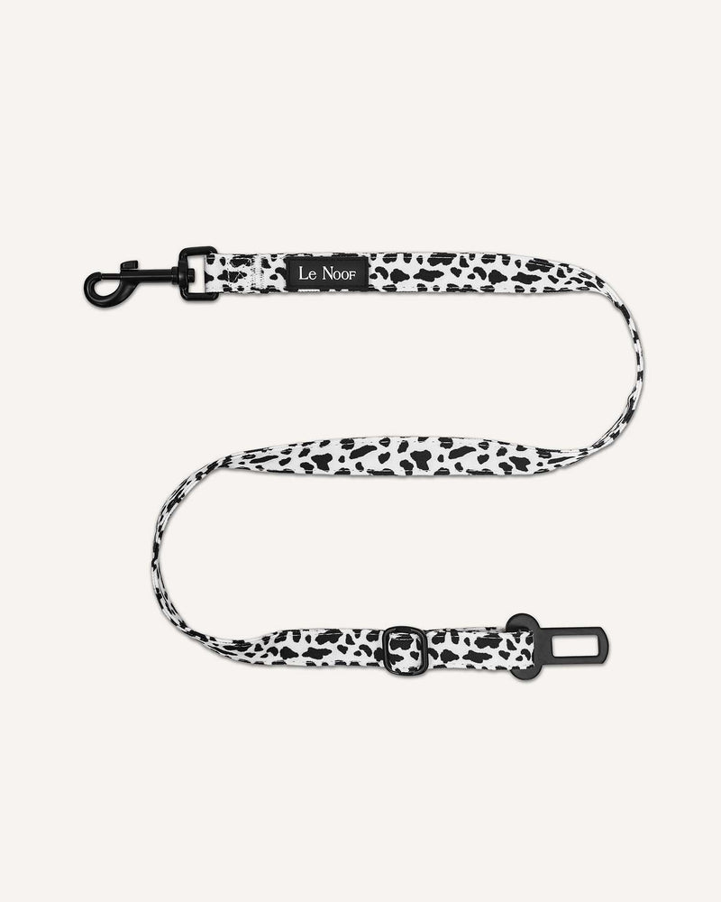 Cow print Le Noof dog seat belt
