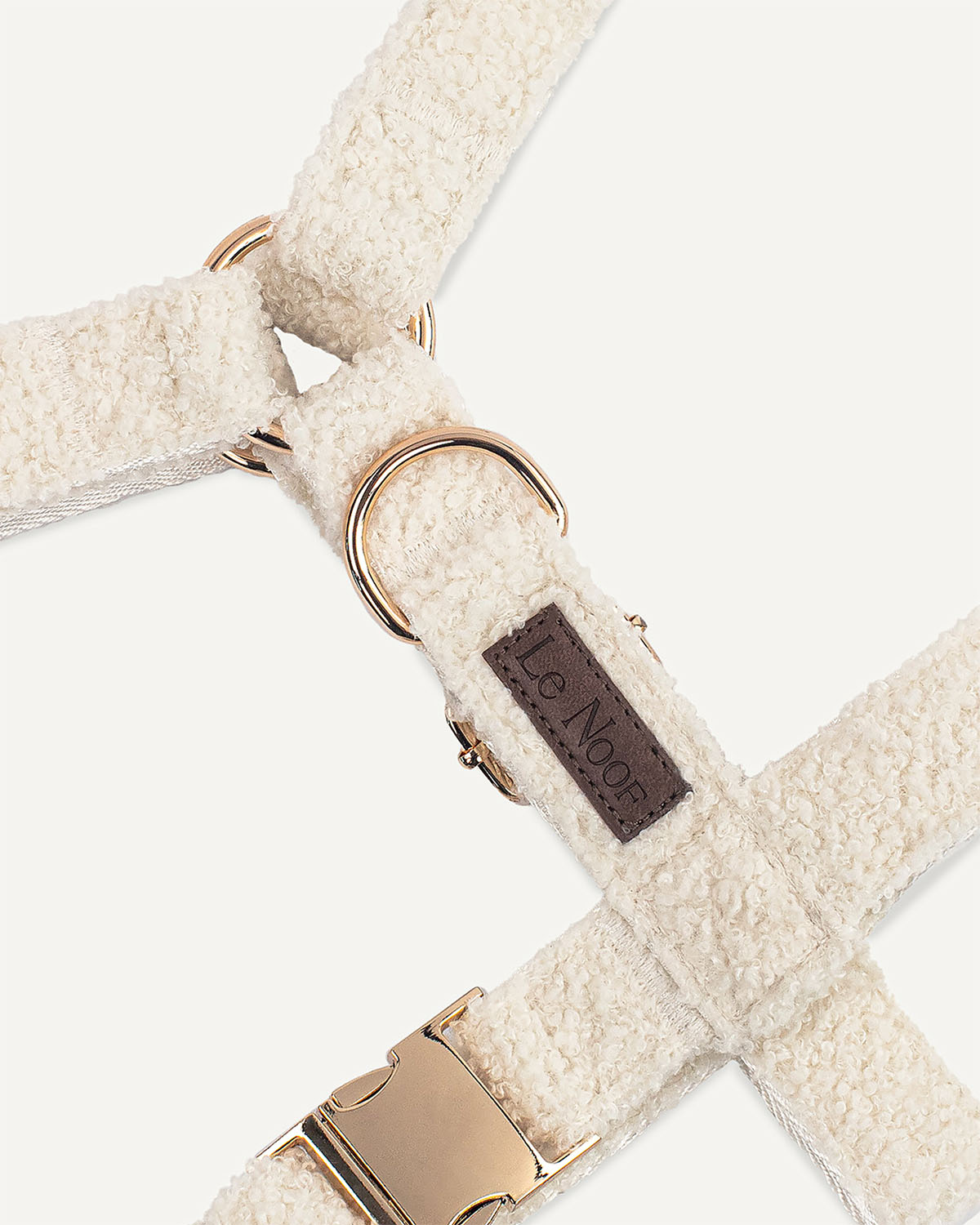 Cream white teddy dog harness with Le Noof logo super closeup