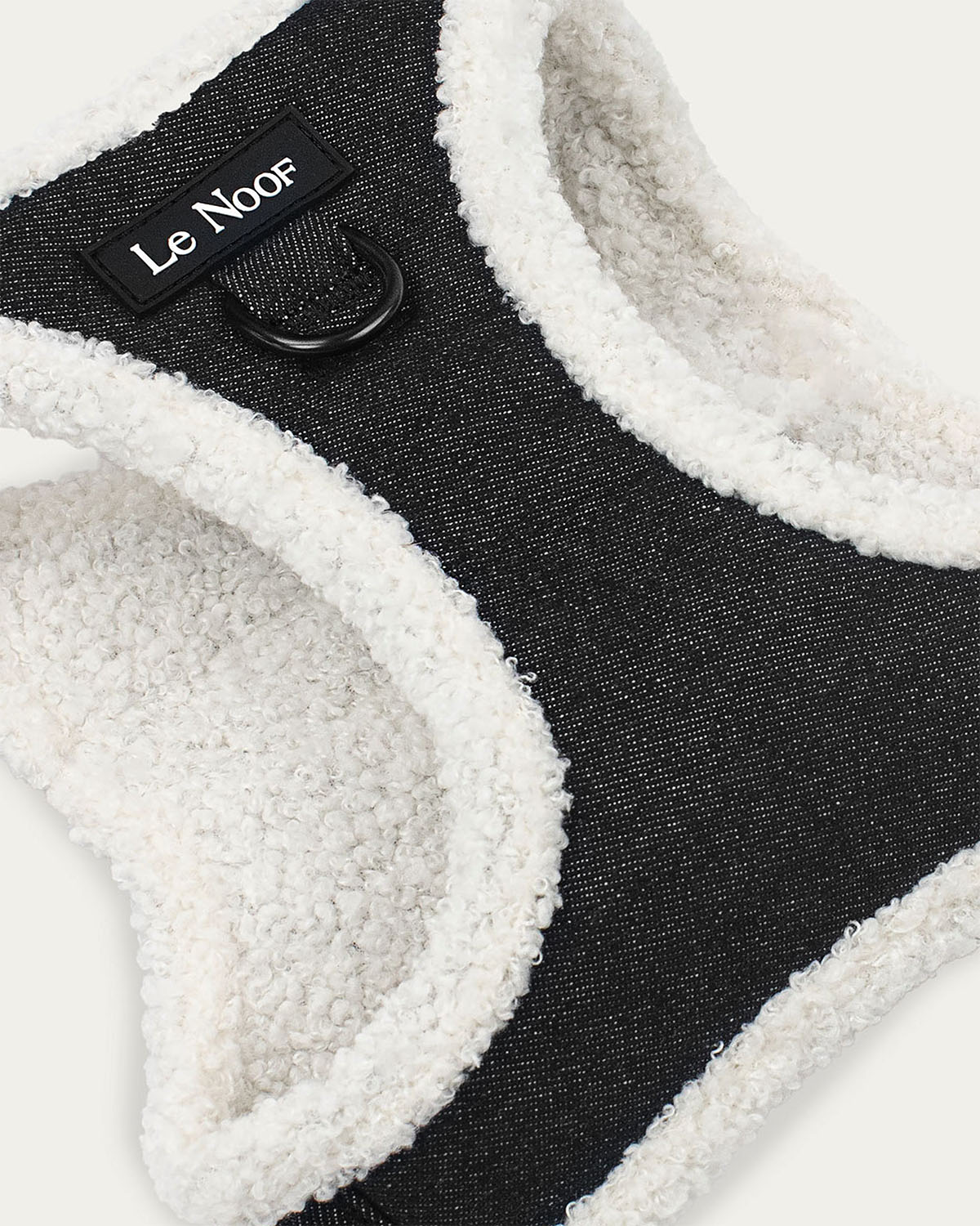 Dark washed denim dog harness with Le Noof logo super closeup