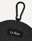 Black denim dog treat pouch with a carabiner and 'Le Noof' label on a white background