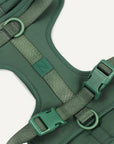 Green dog harness with Le Noof logo super closeup