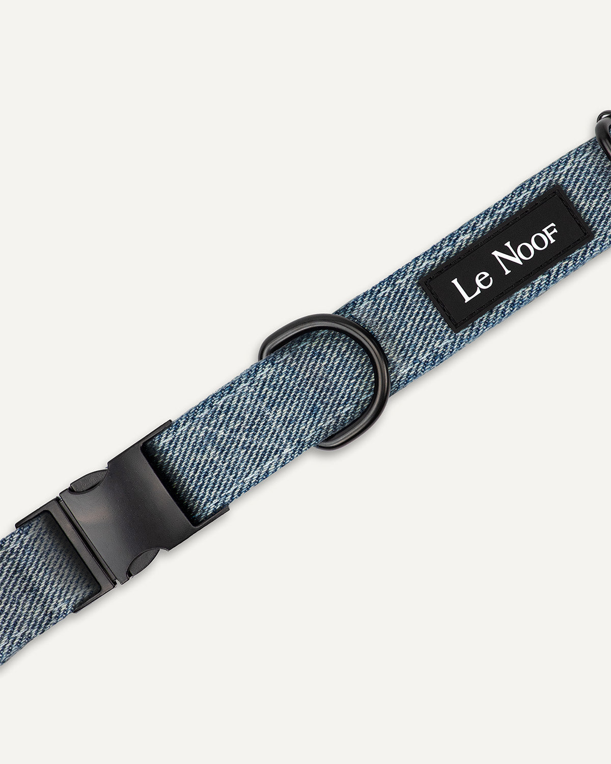Light blue denim dog collar close up image with Le Noof logo
