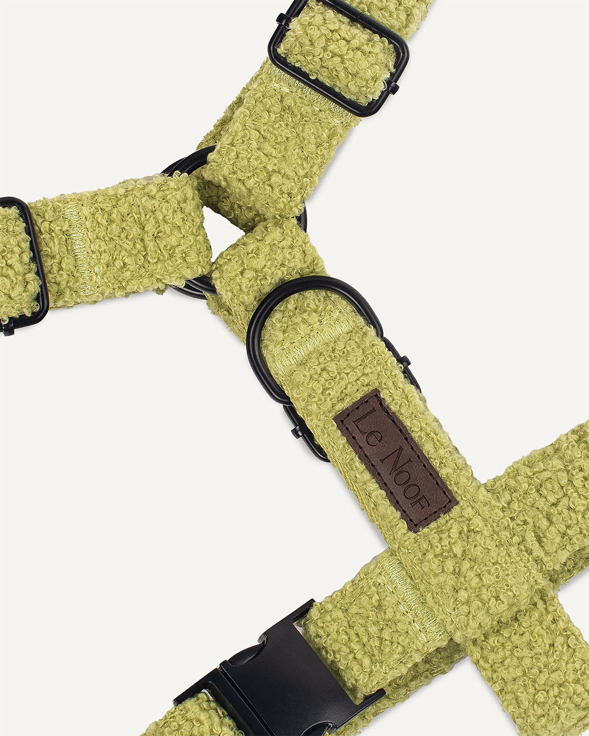 Kelly green teddy dog harness with Le Noof logo super closeup
