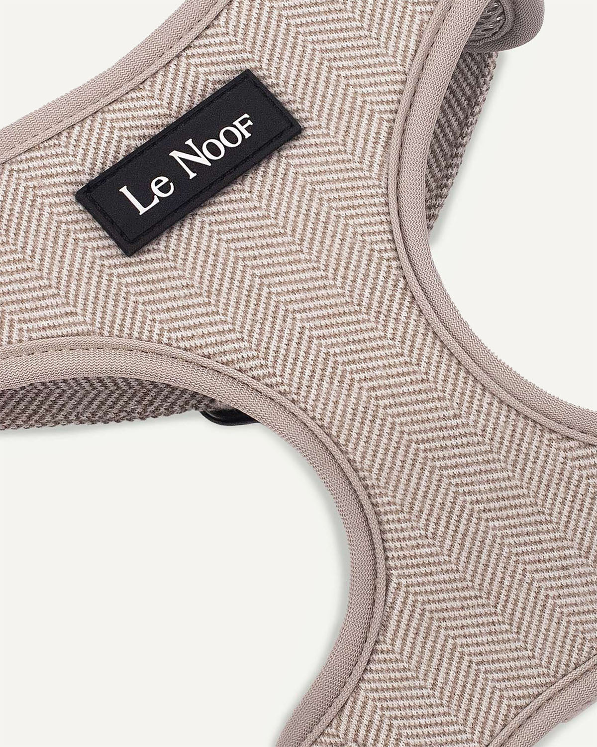 Light brown cotton dog harness with Le Noof logo super closeup