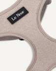 Light brown cotton dog harness with Le Noof logo super closeup